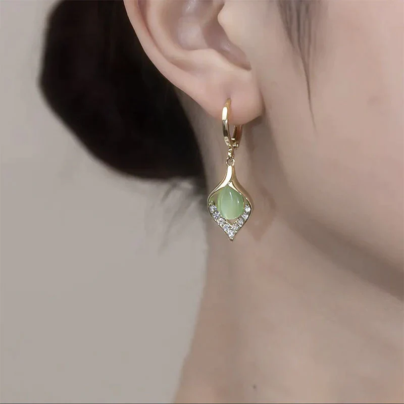 【✨Vásároljon 1 párat és kapjon 1 párat ingyen✨】Fényes macskaszem fülbevaló